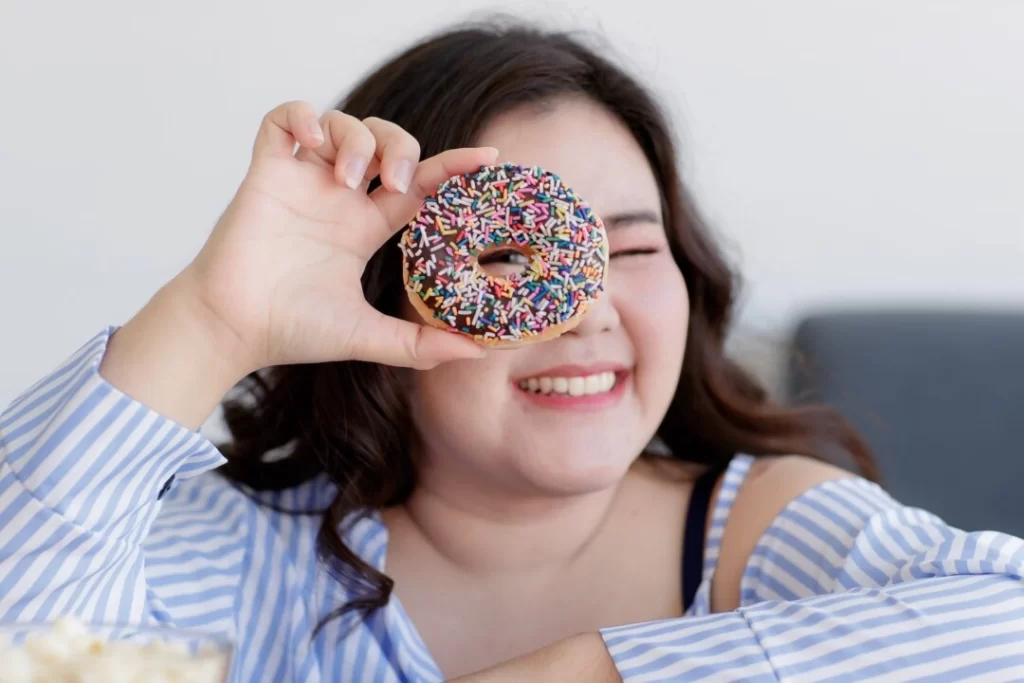asian-woman-with-donut-dr-jose-nasser-aquera-1080x720
